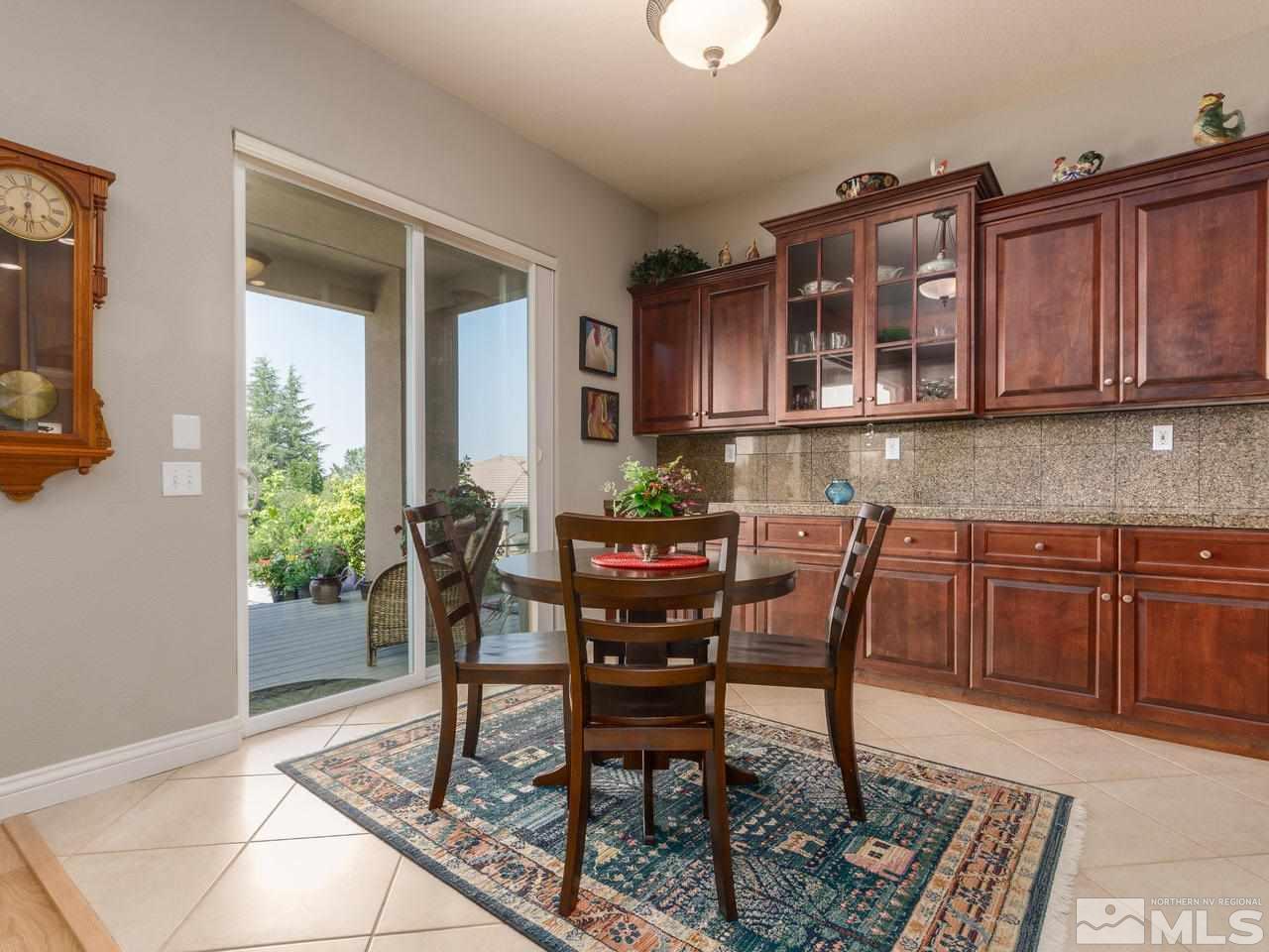 12615 Thomas Creek Road Reno, NV 89511 - Photo 12 of 25 a view of a dining room with furniture