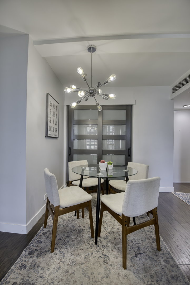 260 East Chestnut Street, Unit 1111 Chicago, IL 60611 - Photo 12 of 29 a workspace room with furniture