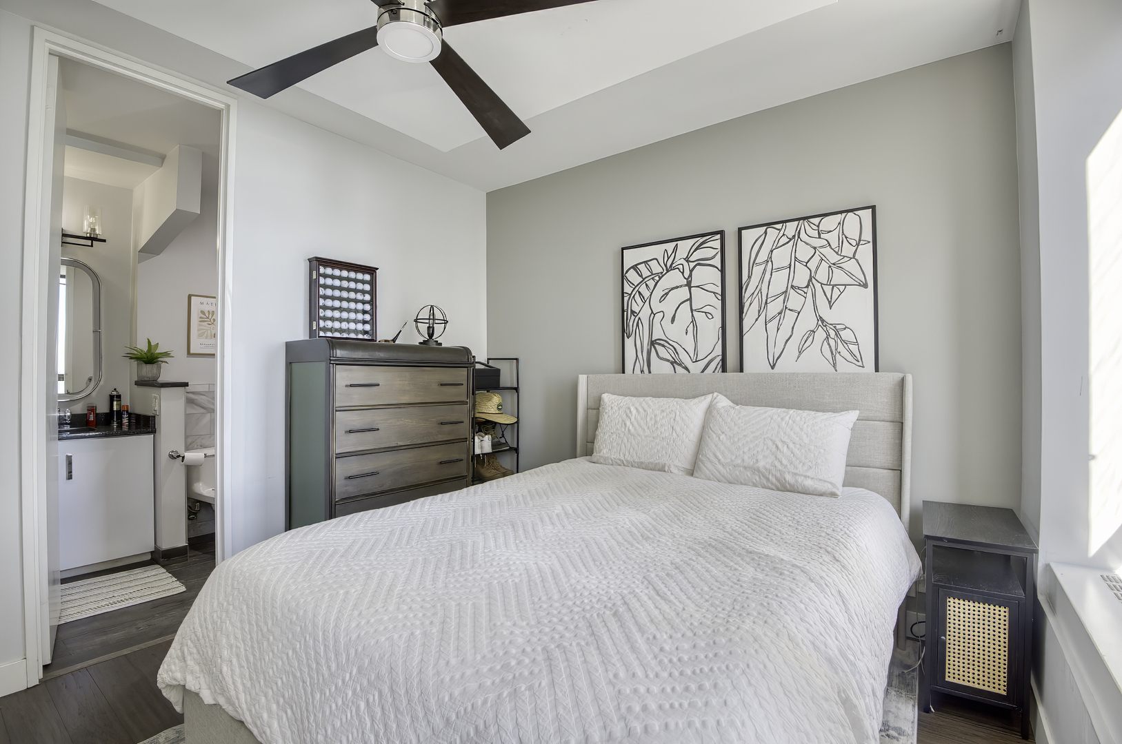 260 East Chestnut Street, Unit 1111 Chicago, IL 60611 - Photo 17 of 29 a bedroom with a bed and a dresser