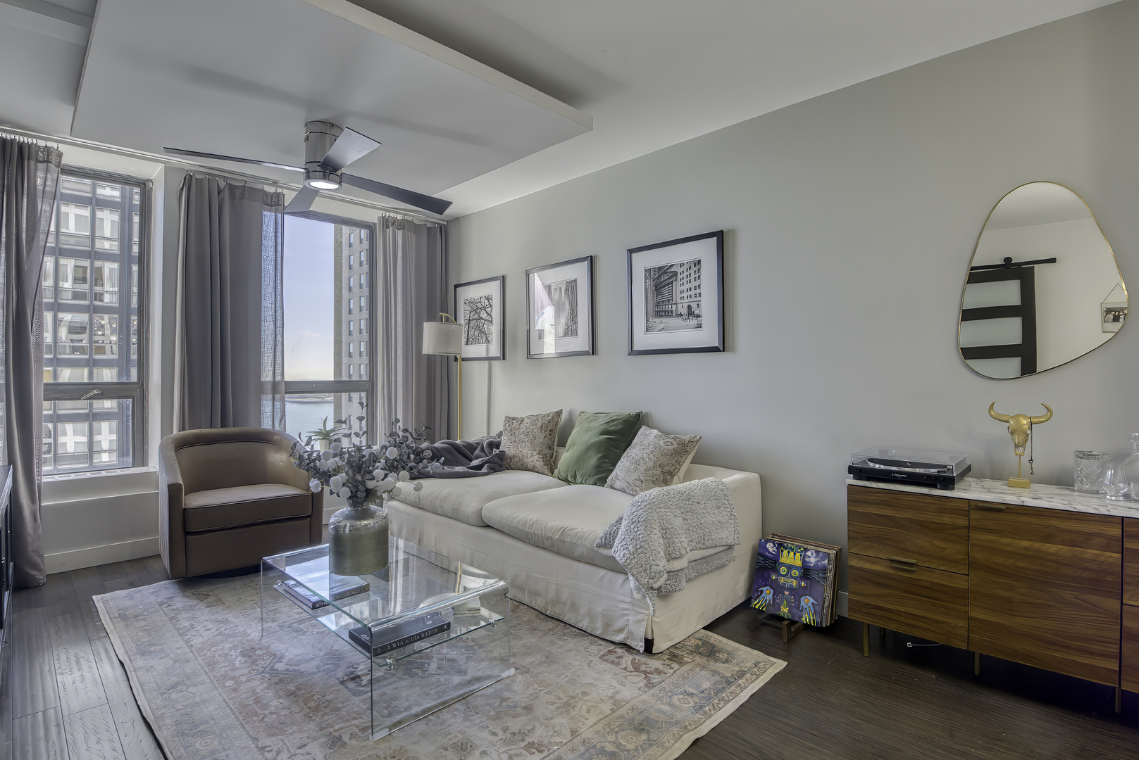 260 East Chestnut Street, Unit 1111 Chicago, IL 60611 - Photo 3 of 29 a living room with furniture and a window