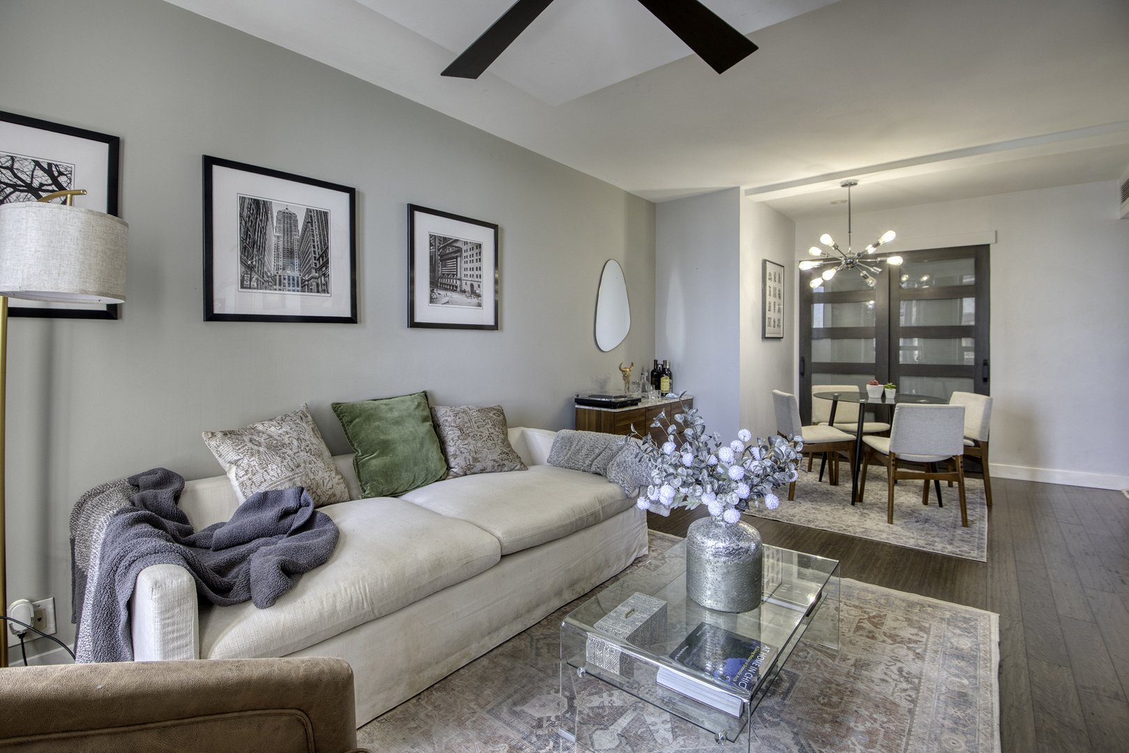 260 East Chestnut Street, Unit 1111 Chicago, IL 60611 - Photo 8 of 29 a living room with furniture and wooden floor