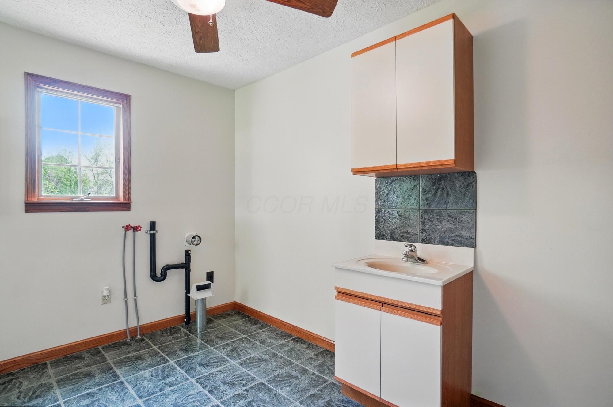 5870 Brook Road Northwest Baltimore, OH 43105 - Photo 27 of 70 1st Floor, Half Bath & Laundry - 5870 Brook Road NW, Baltimore, OH 43105