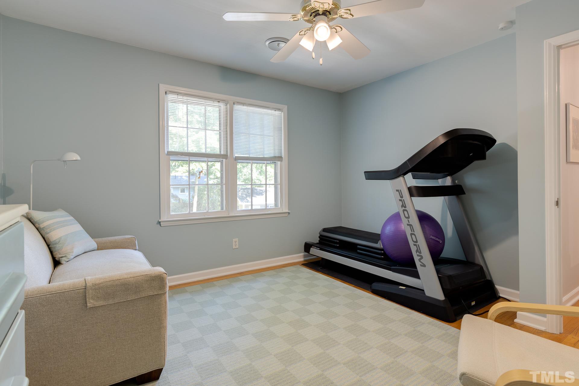 613 Ortega Road Raleigh, NC 27609 - Photo 24 of 37 a living room with furniture and a window