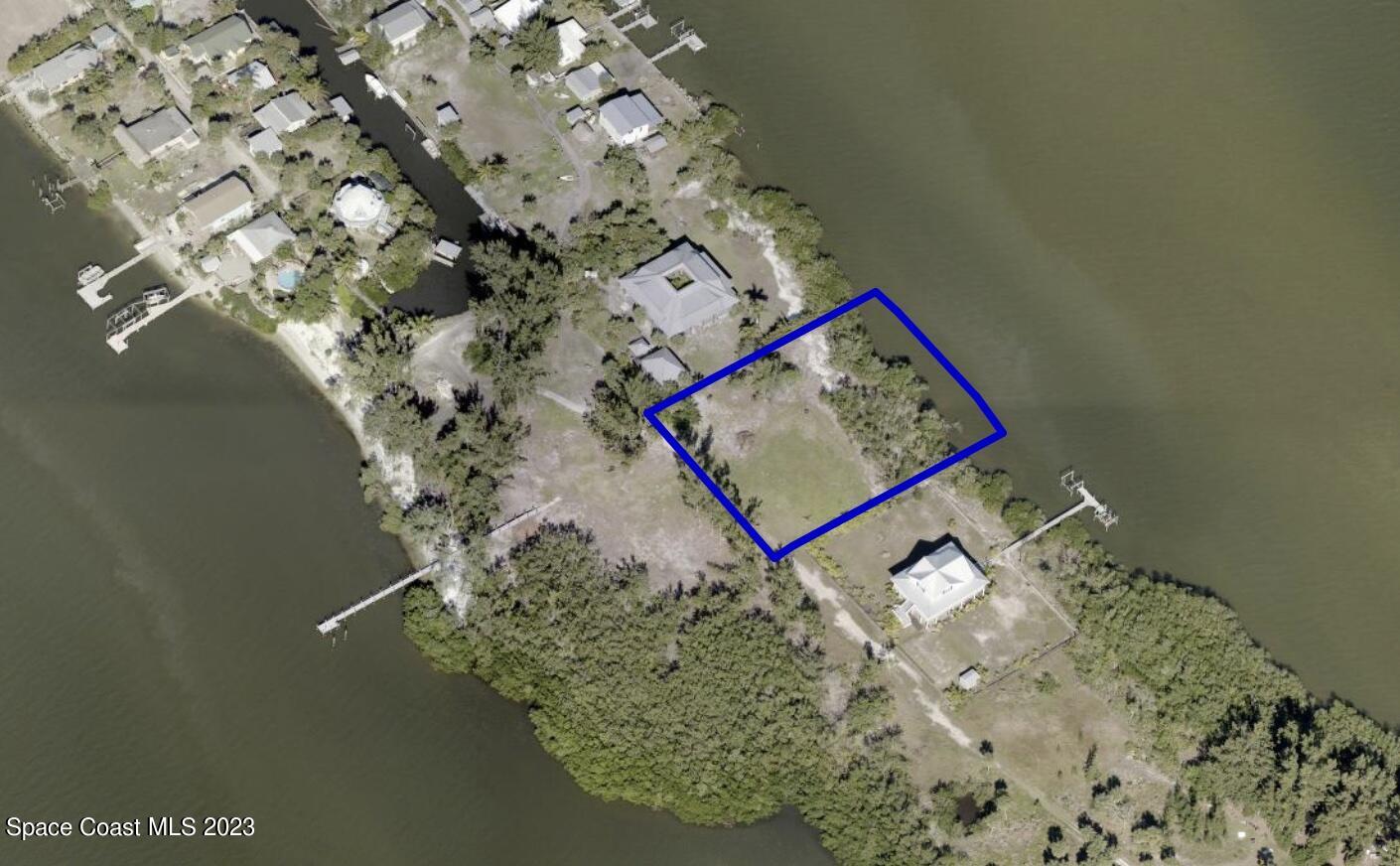 2 Grant Island Estates Grant, FL 32949 - Photo 2 of 13 view of a book with a tree in it