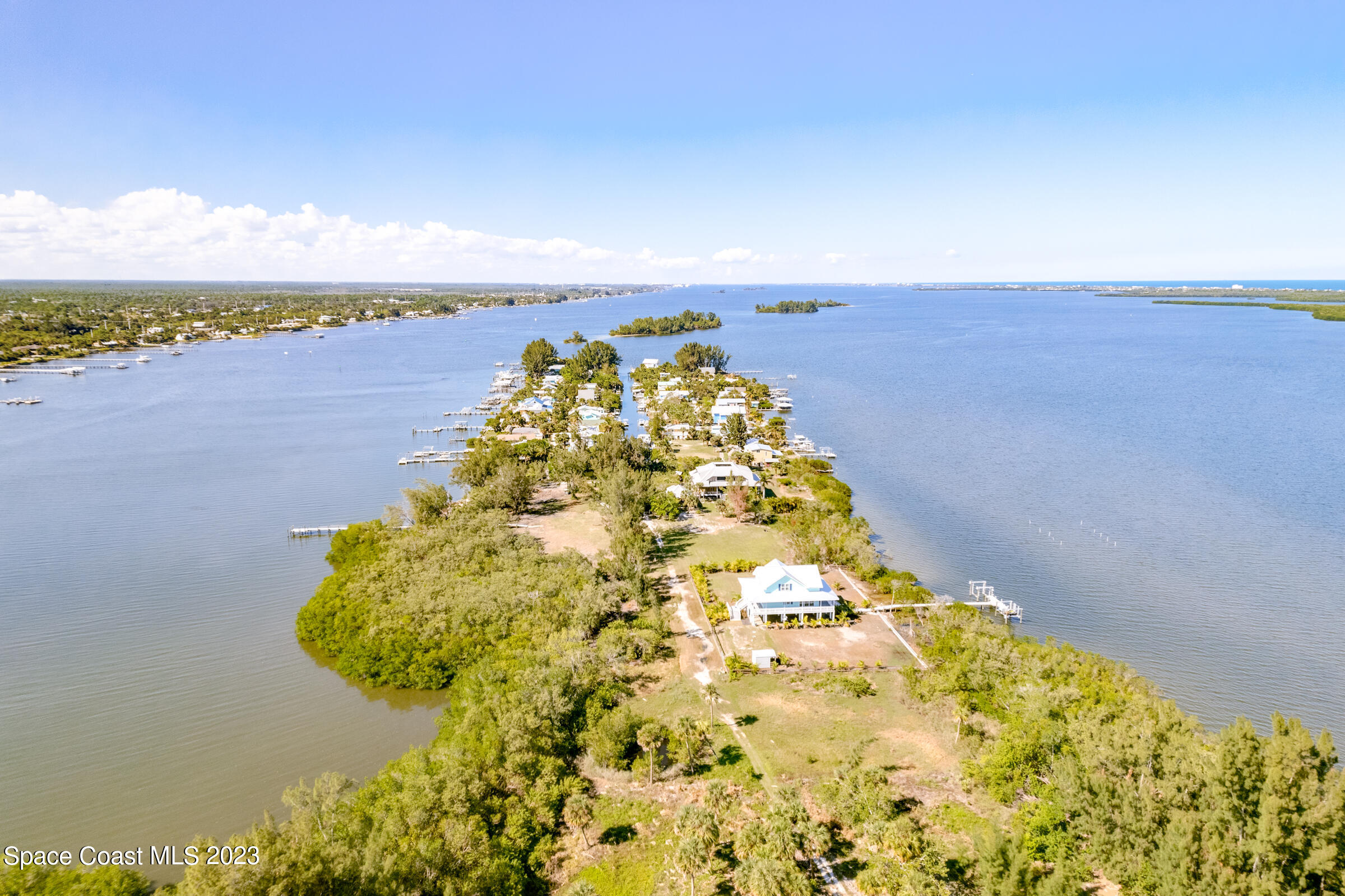 2 Grant Island Estates Grant, FL 32949 - Photo 3 of 13 a balcony with swimming pool and ocean view