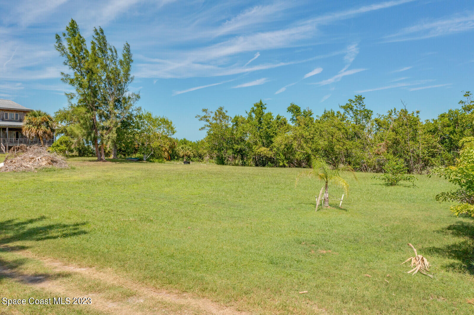 2 Grant Island Estates Grant, FL 32949 - Photo 7 of 13 a view of a lake with a yard