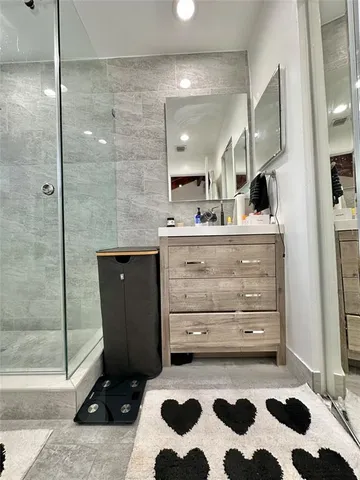 a view of a chairs and table in the patio