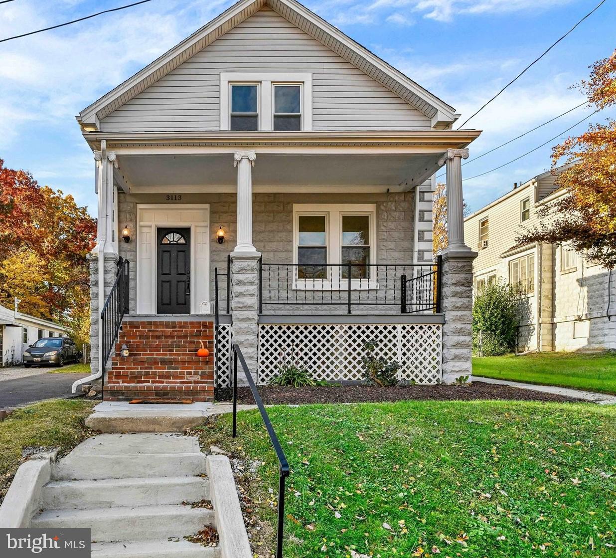 3113 California Avenue Baltimore, MD 21234 - Photo 2 of 29 a front view of a house with a yard