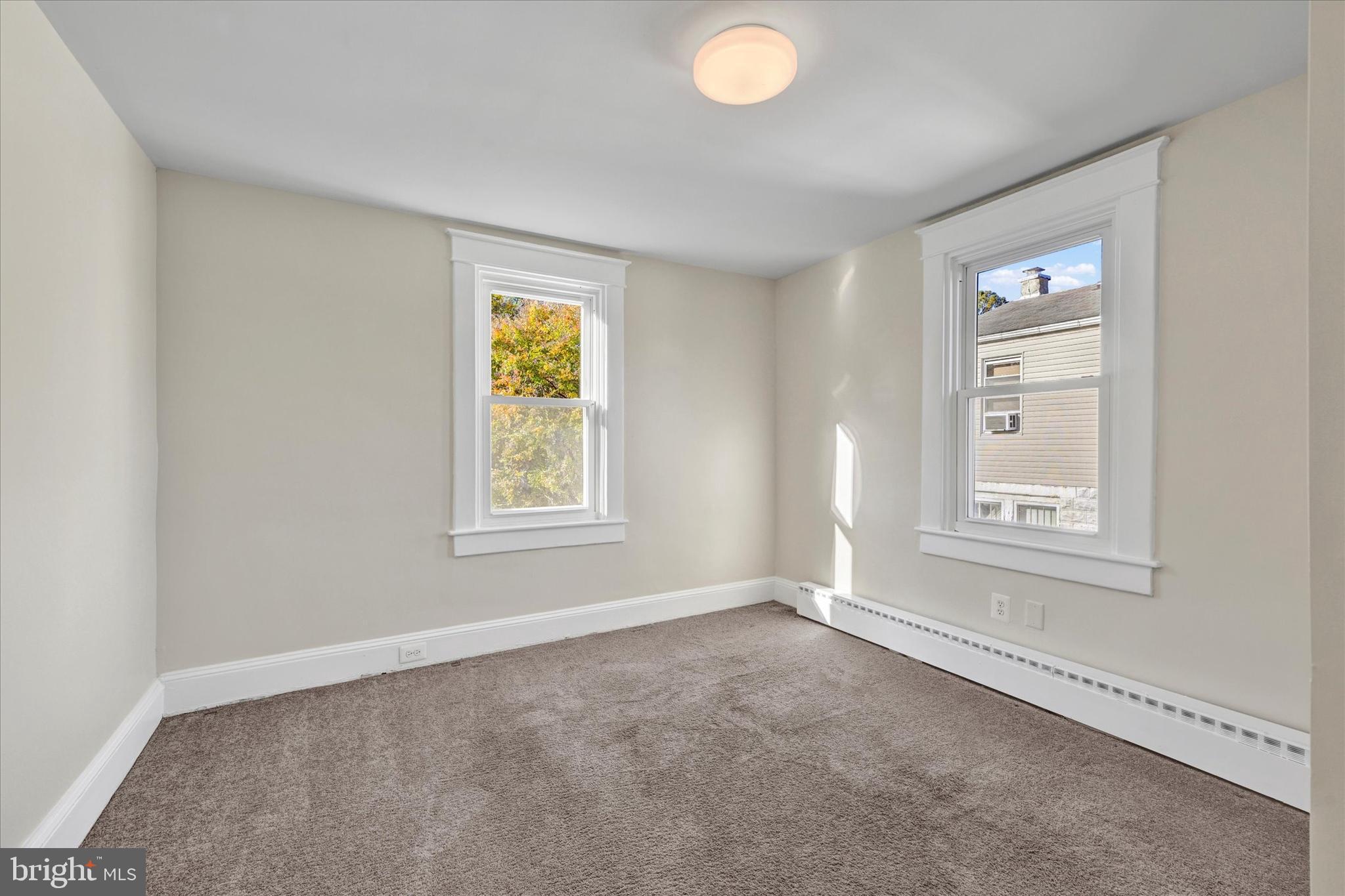 3113 California Avenue Baltimore, MD 21234 - Photo 20 of 29 a view of an empty room with a window