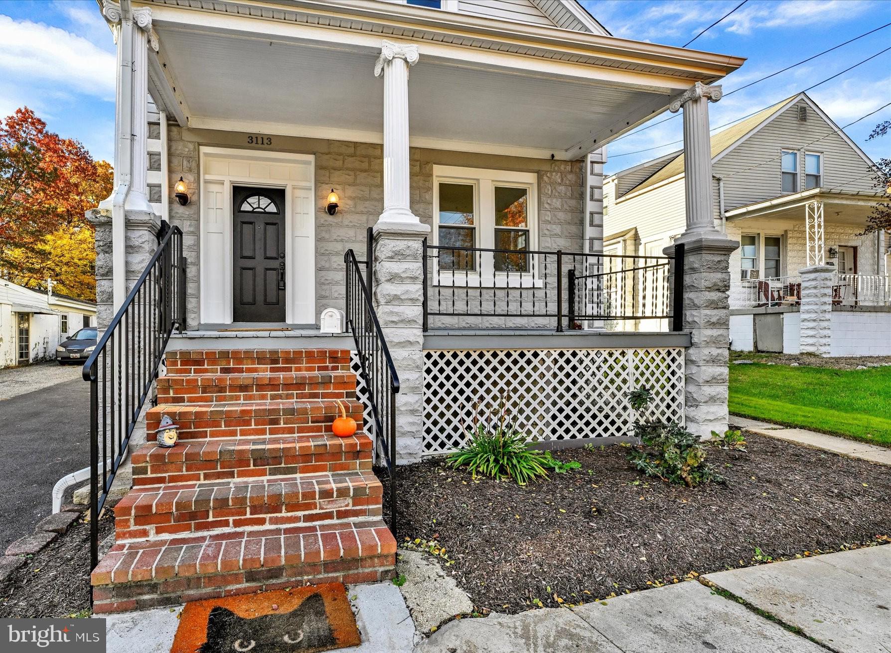 3113 California Avenue Baltimore, MD 21234 - Photo 27 of 29 a front view of a house with a garden