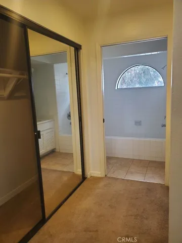 an empty room with mirror