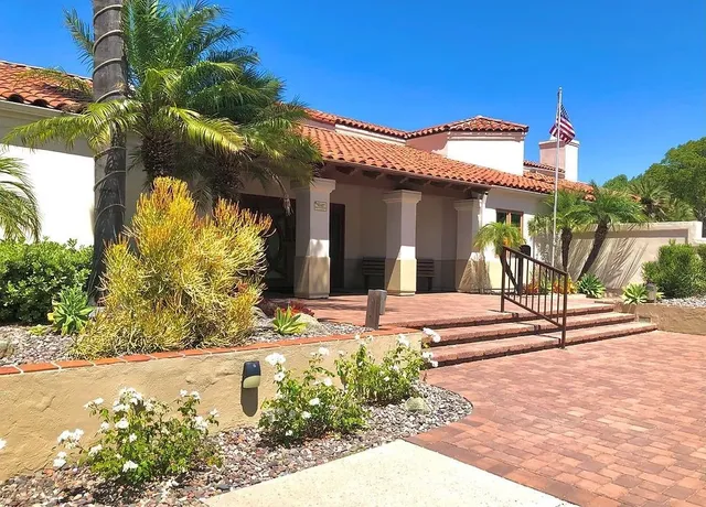 a view of gym equipment and living room