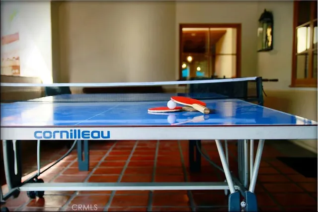 swimming pool view with a garden space
