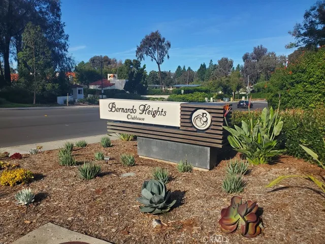 a view of a street with sign board