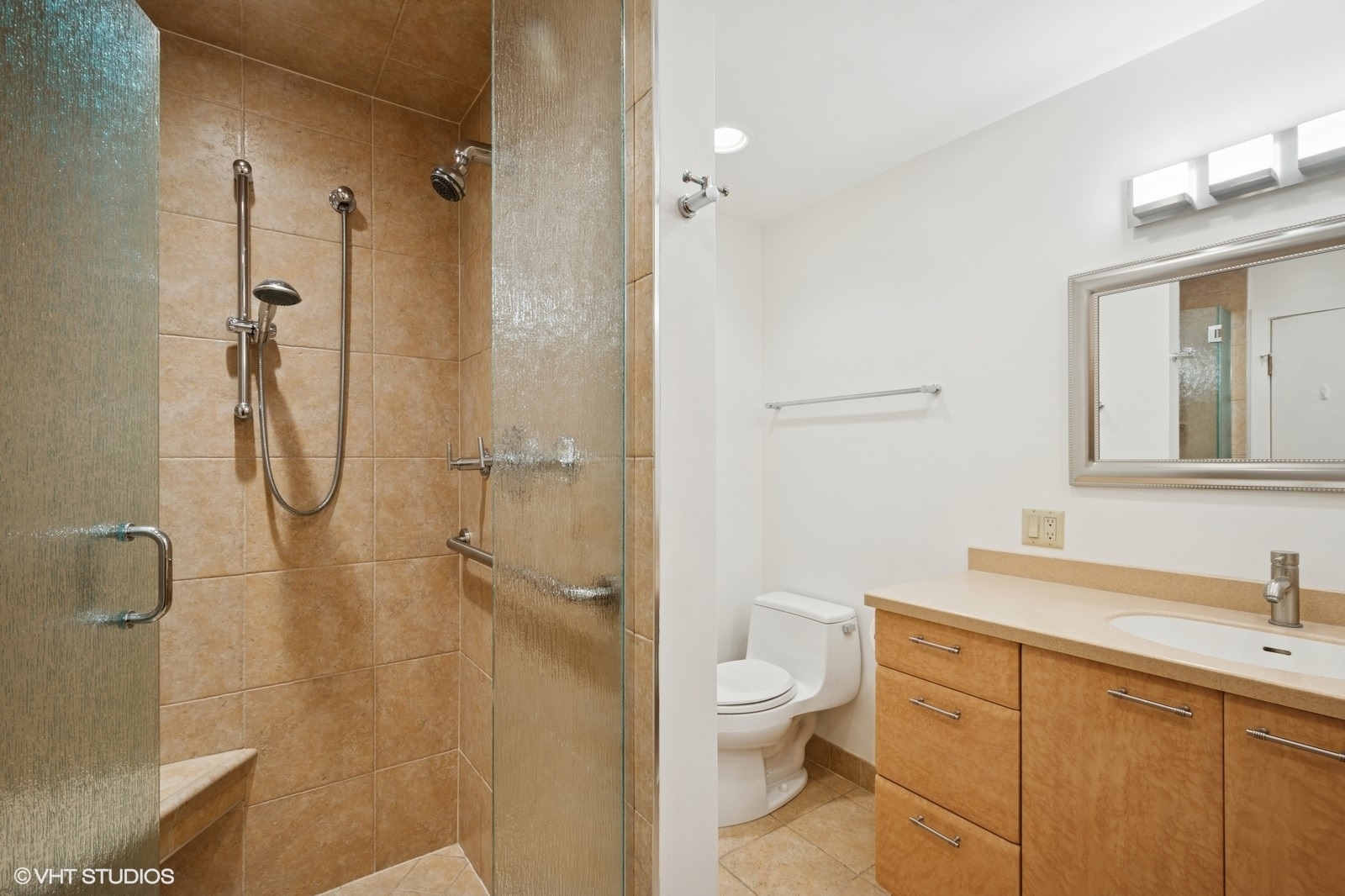 1100 North Lake Shore Drive, Unit 11B Chicago, IL 60611 - Photo 17 of 25 a bathroom with a granite countertop sink toilet and shower