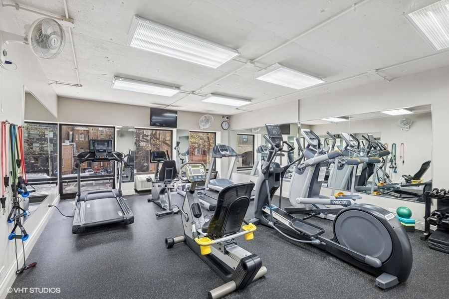 1100 North Lake Shore Drive, Unit 11B Chicago, IL 60611 - Photo 22 of 25 a view of a room with gym equipment