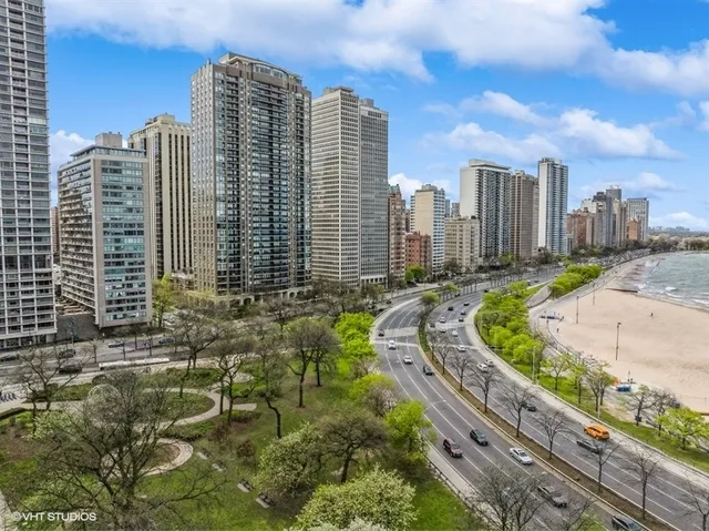 a view of a city with tall buildings