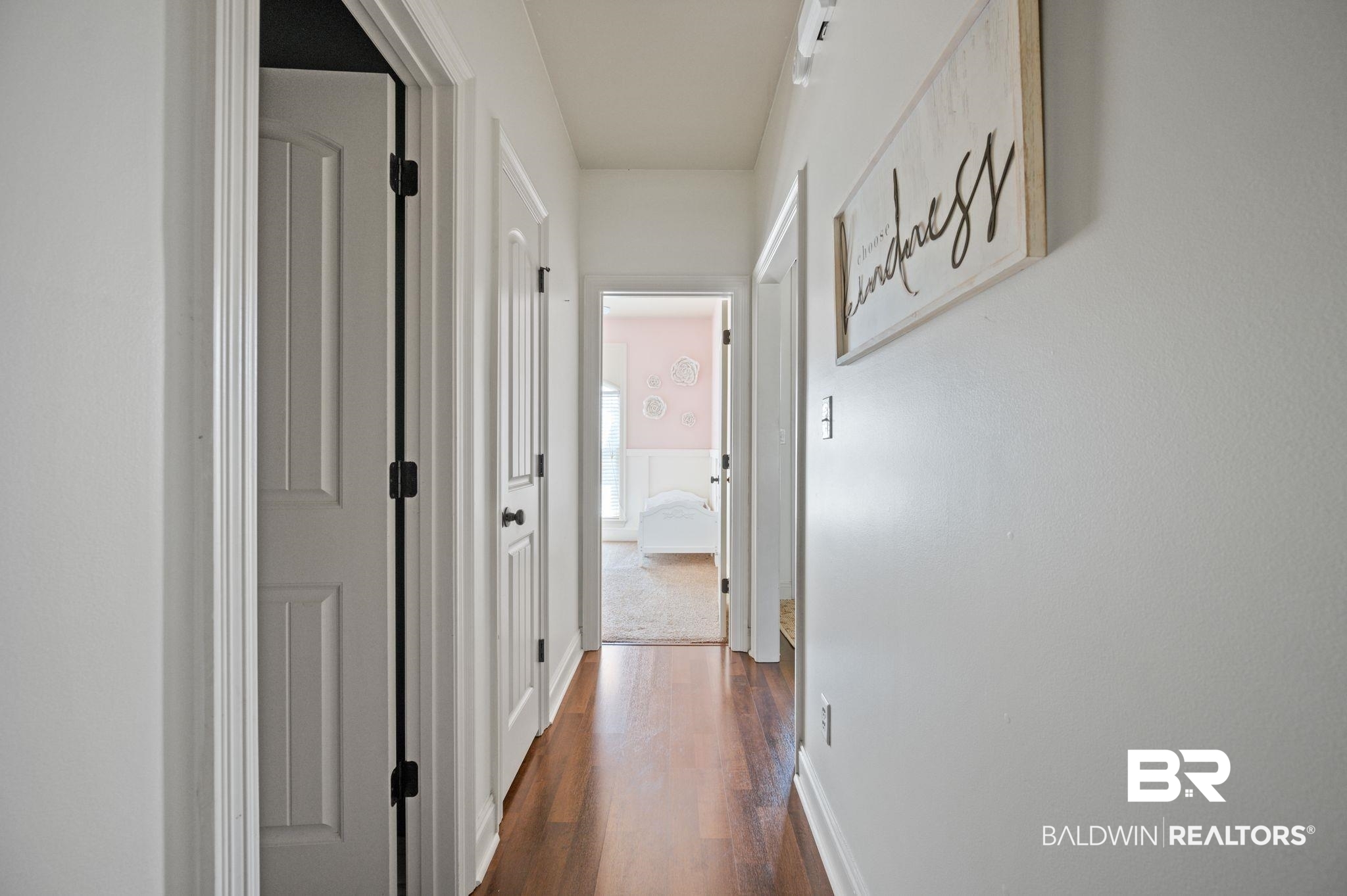 3879 Symphony Way West Semmes, AL 36575 - Photo 28 of 34 Hallway featuring dark wood-type flooring