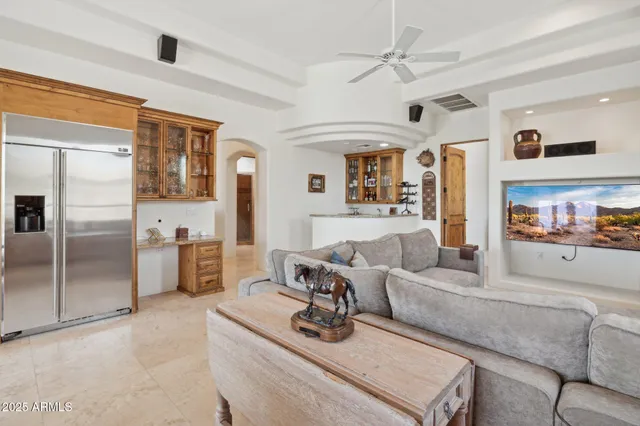 a bedroom with a bed and dresser