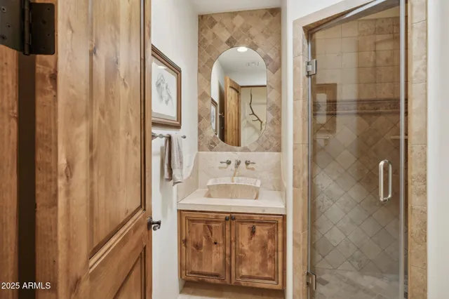 a view of a patio with a table and chairs