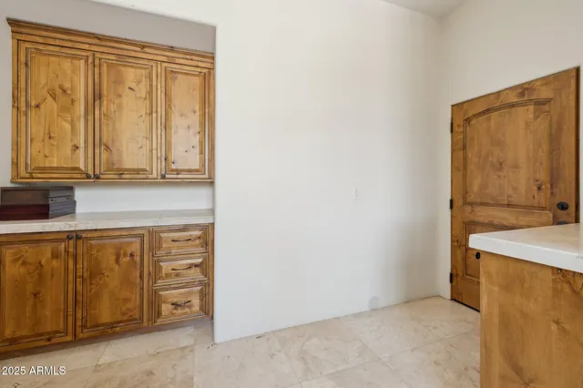 a view of mountain covered with snow in the background