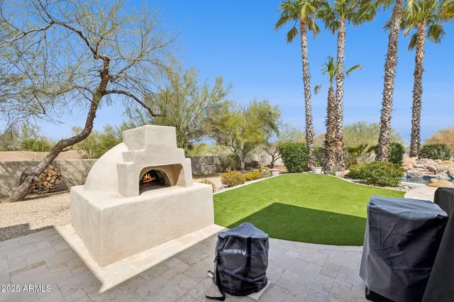 an aerial view of residential house with outdoor space