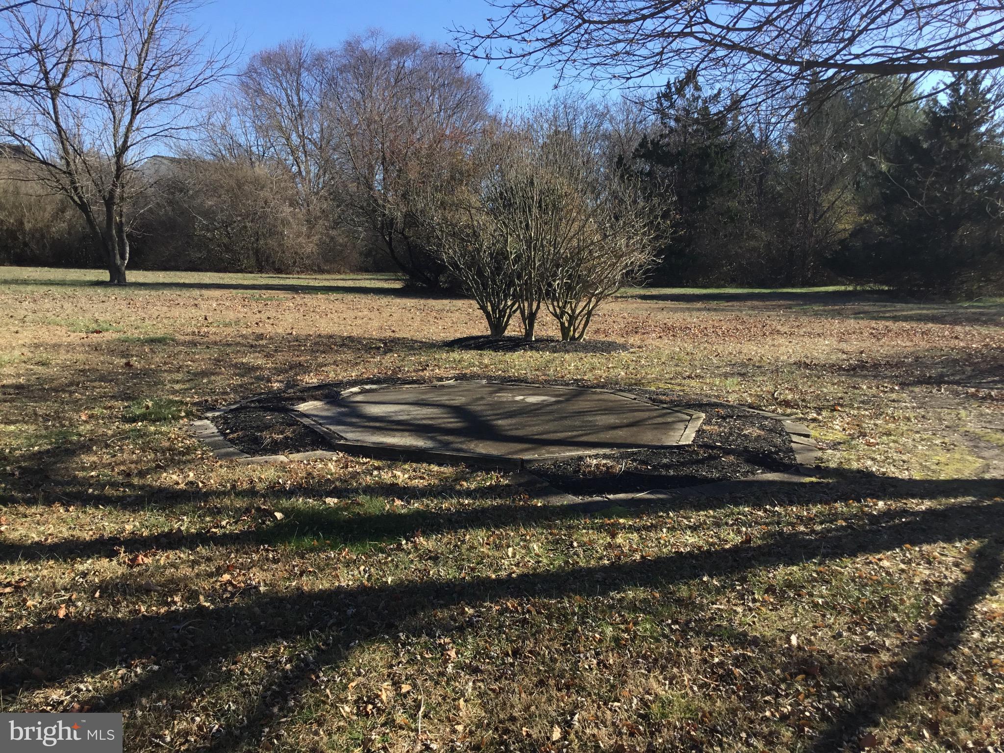 24 McIntosh Road Sewell, NJ 08080 - Photo 21 of 23 a view of a yard with wooden fence