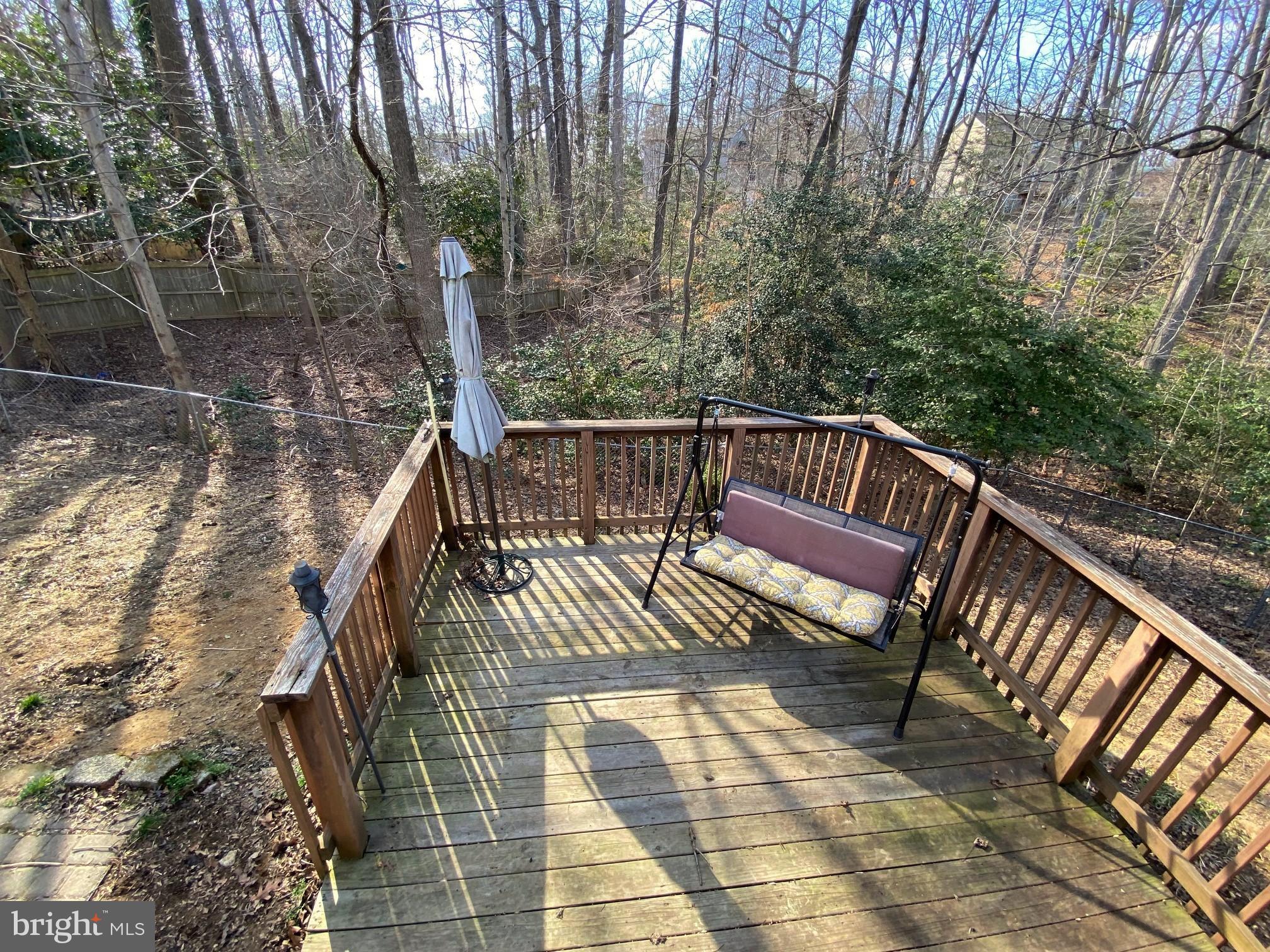 540 Platte Road Lusby, MD 20657 - Photo 13 of 16 a view of balcony with wooden floor and outdoor seating