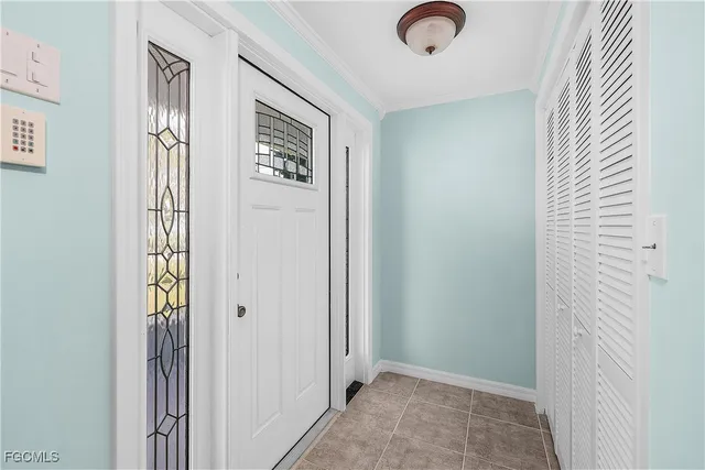 a lake view with boat and palm trees