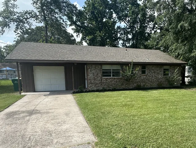 a front view of a house with yard
