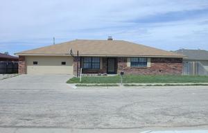 front view of house with a yard