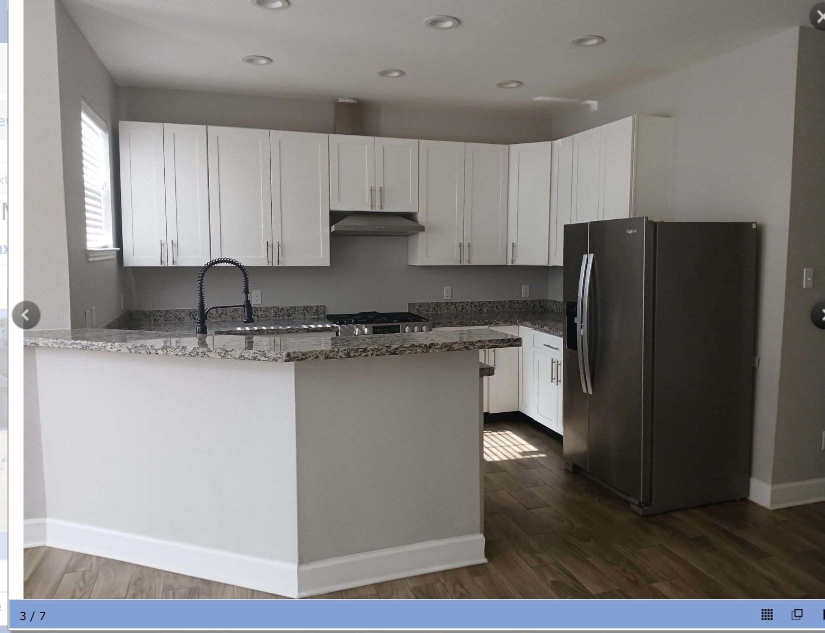 4122 Mallow Street, Unit B Houston, TX 77051 - Photo 3 of 11 a kitchen with stainless steel appliances granite countertop a refrigerator sink and cabinets