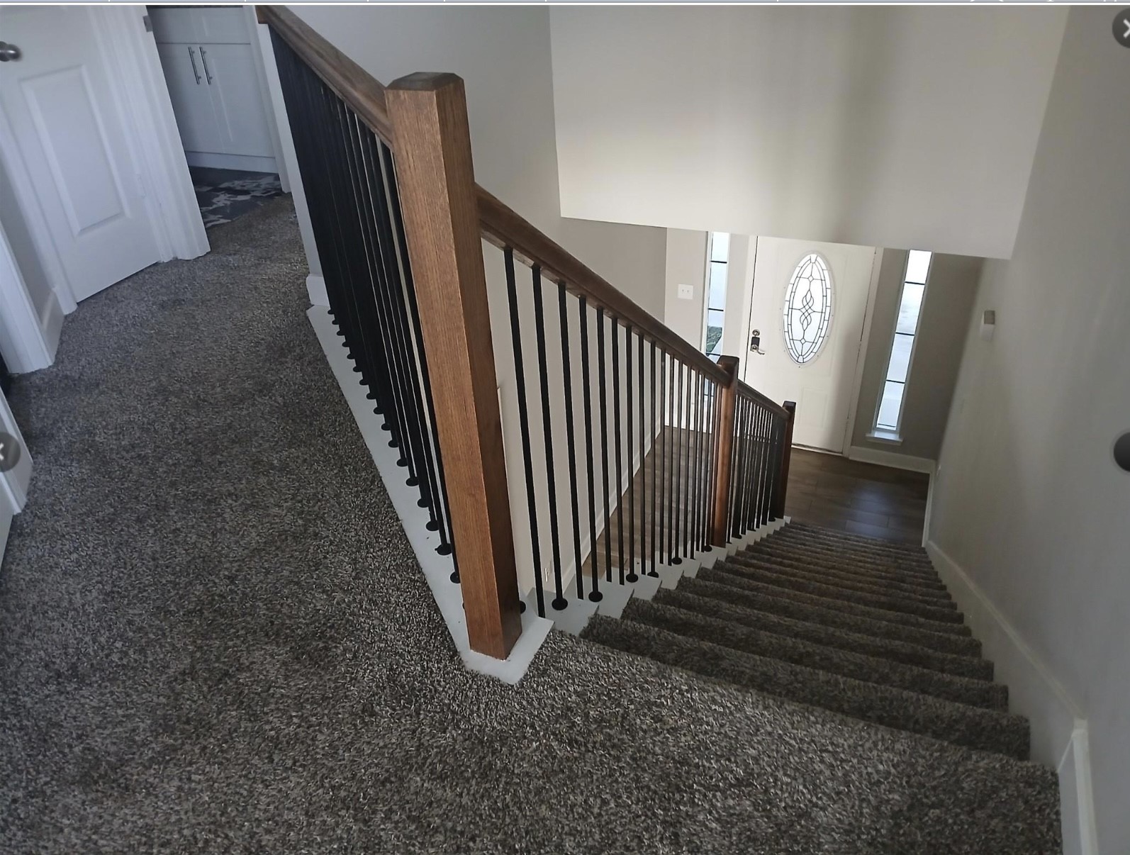 4122 Mallow Street, Unit B Houston, TX 77051 - Photo 5 of 11 a view of a hallway with staircase