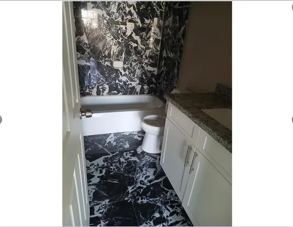 a bathroom with a toilet