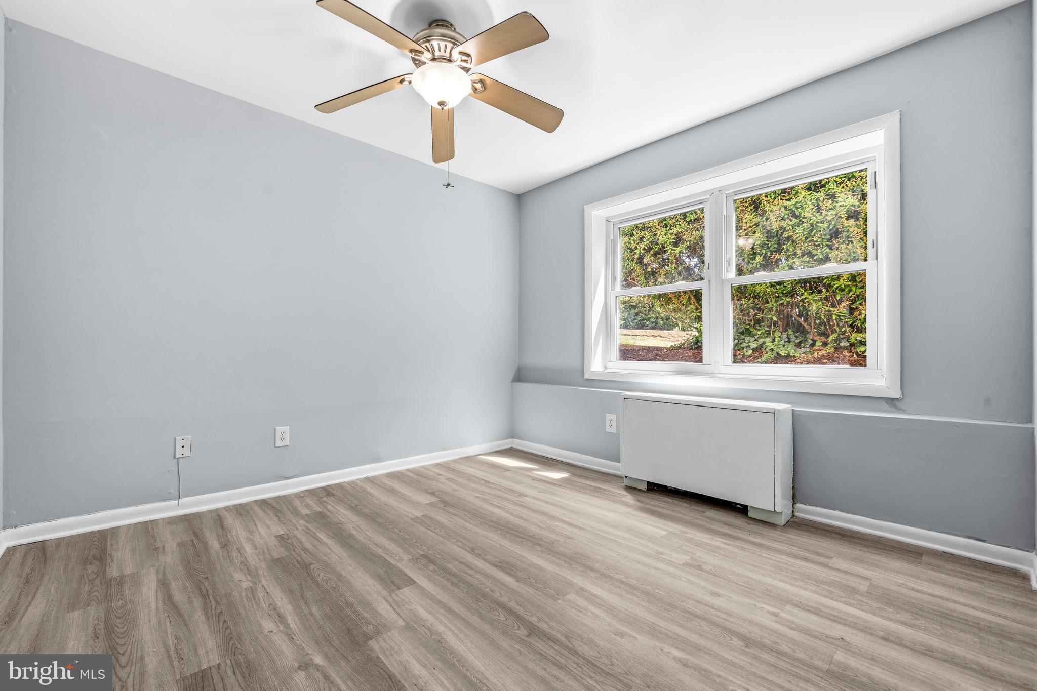 4260 Buckman Road, Unit 43 Alexandria, VA 22309 - Photo 18 of 35 wooden floor in an empty room with a window