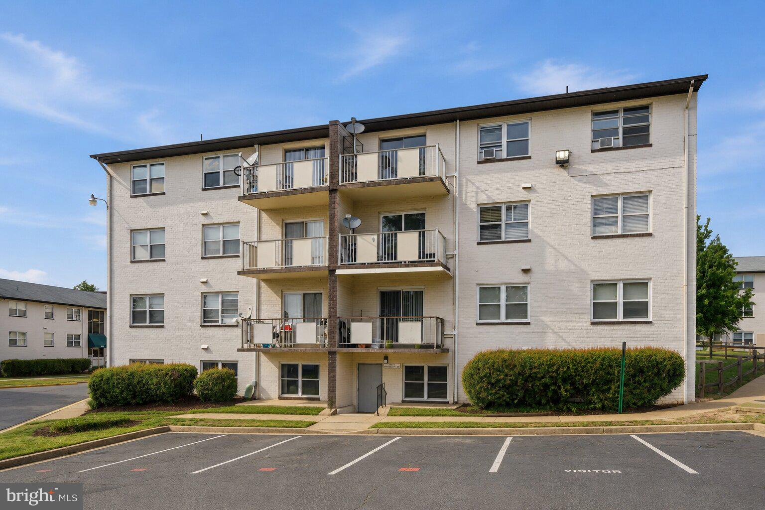 4260 Buckman Road, Unit 43 Alexandria, VA 22309 - Photo 2 of 35 a front view of a building with a street