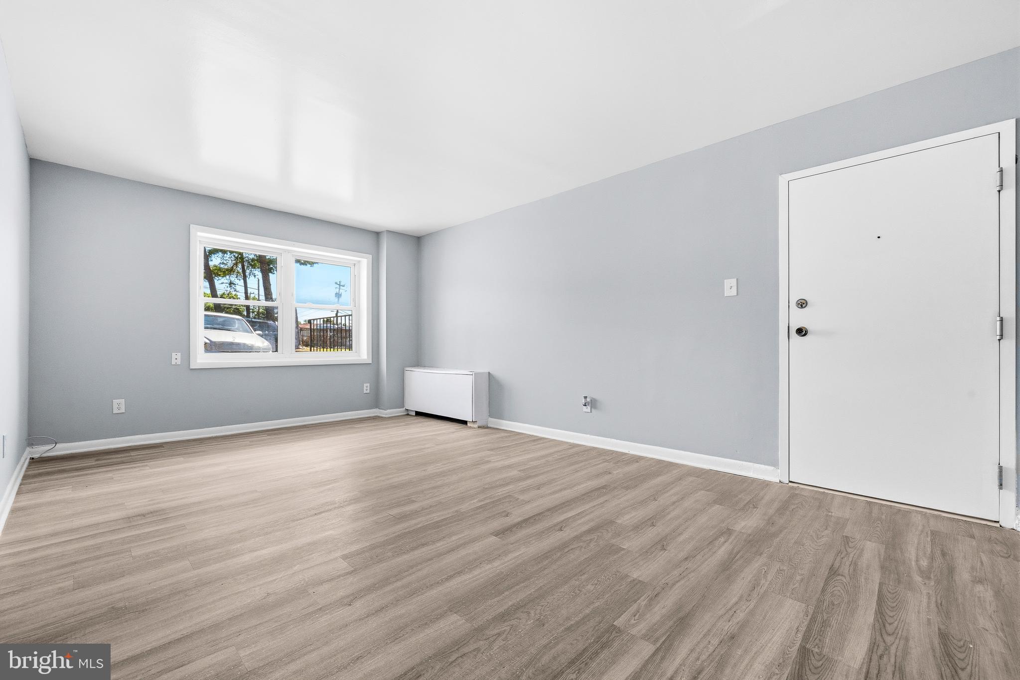 4260 Buckman Road, Unit 43 Alexandria, VA 22309 - Photo 3 of 35 wooden floor in an empty room with a window