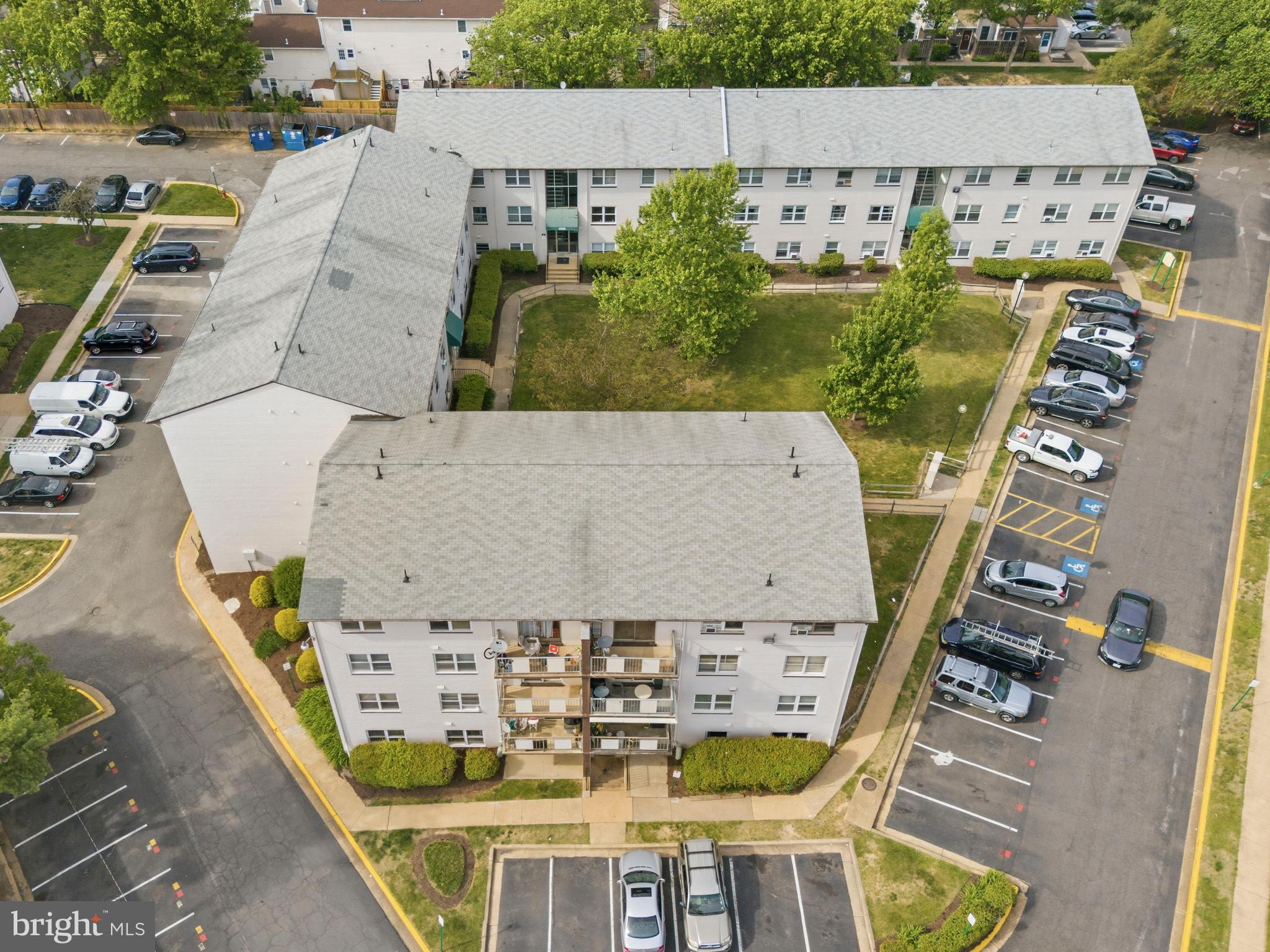 4260 Buckman Road, Unit 43 Alexandria, VA 22309 - Photo 31 of 35 an aerial view of a swimming pool with outdoor seating and trees