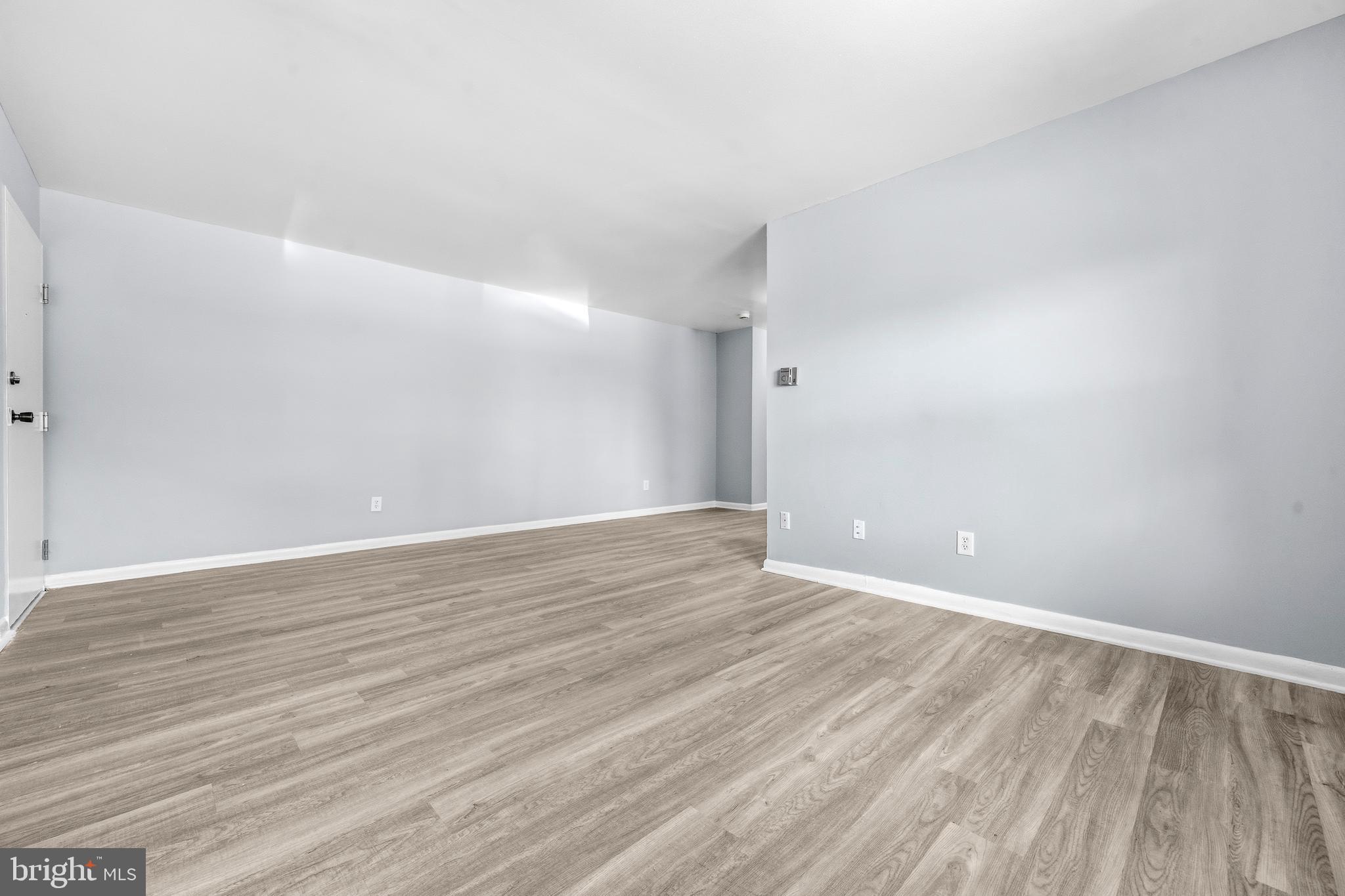 4260 Buckman Road, Unit 43 Alexandria, VA 22309 - Photo 7 of 35 a view of an empty room with wooden floor