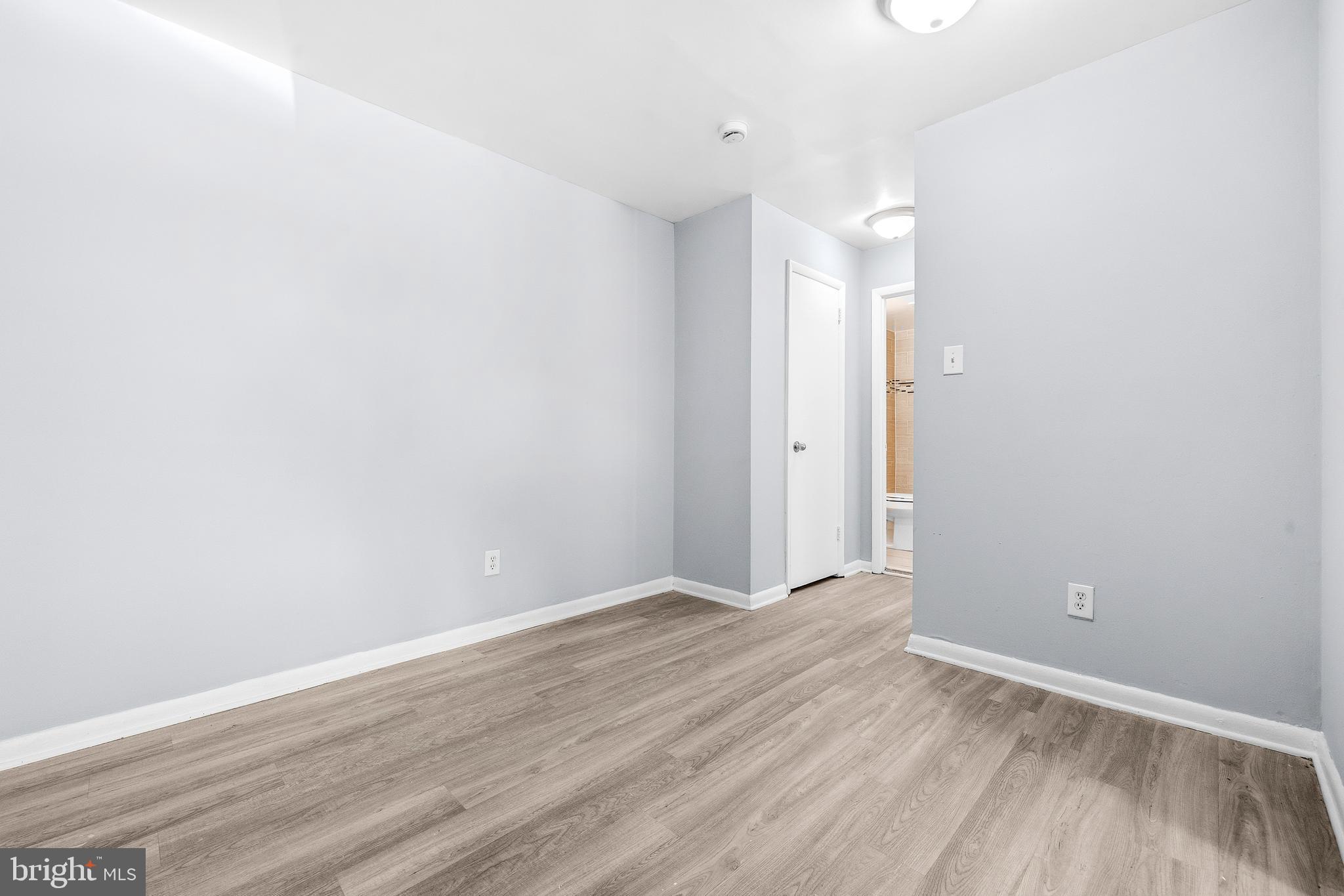 4260 Buckman Road, Unit 43 Alexandria, VA 22309 - Photo 10 of 35 a view of an empty room with wooden floor