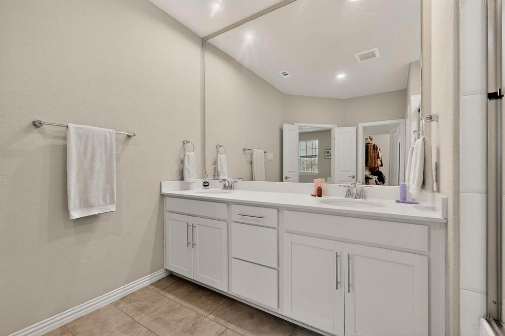 1027 Zachary Way Allen, TX 75013 - Photo 18 of 35 Quartz Countertops & large mastre closet