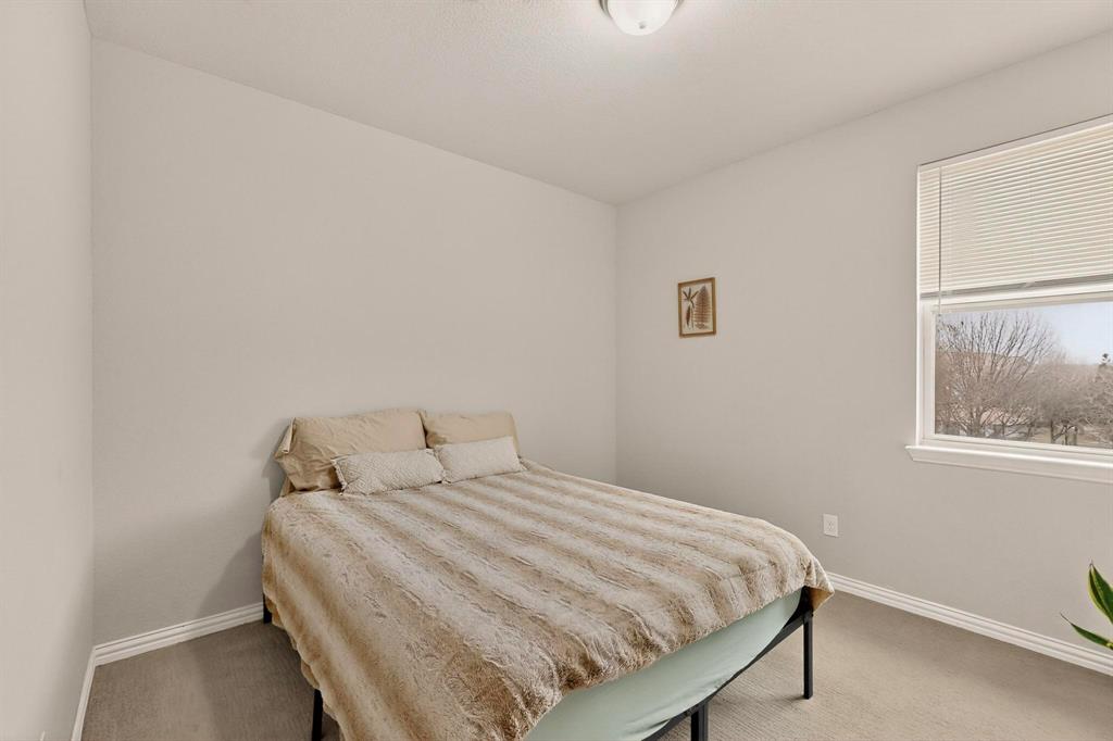 1027 Zachary Way Allen, TX 75013 - Photo 20 of 35 Guest or secondary room upstairs, walk-in closet