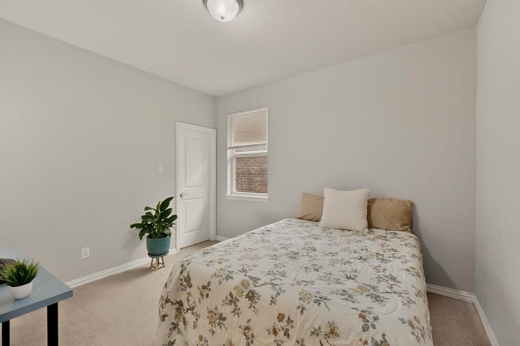1027 Zachary Way Allen, TX 75013 - Photo 22 of 35 Spacious secondary bedrooms