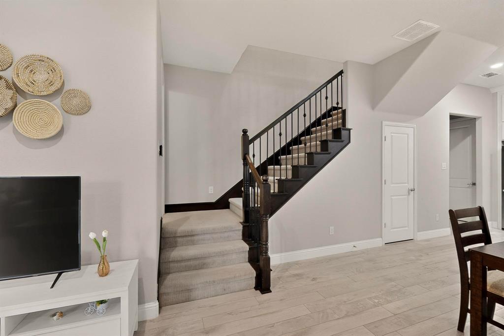 1027 Zachary Way Allen, TX 75013 - Photo 3 of 35 Wrought iron staircase spindals