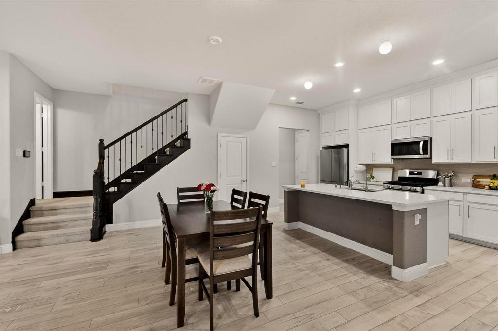1027 Zachary Way Allen, TX 75013 - Photo 9 of 35 Spacious kitchen with recessed lighting loaded with white cabinets