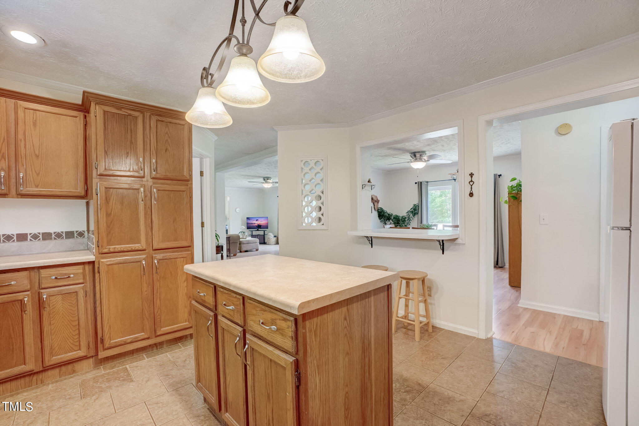7204 New Sharon Church Road Rougemont, NC 27572 - Photo 11 of 48 a kitchen with a refrigerator a sink and cabinets