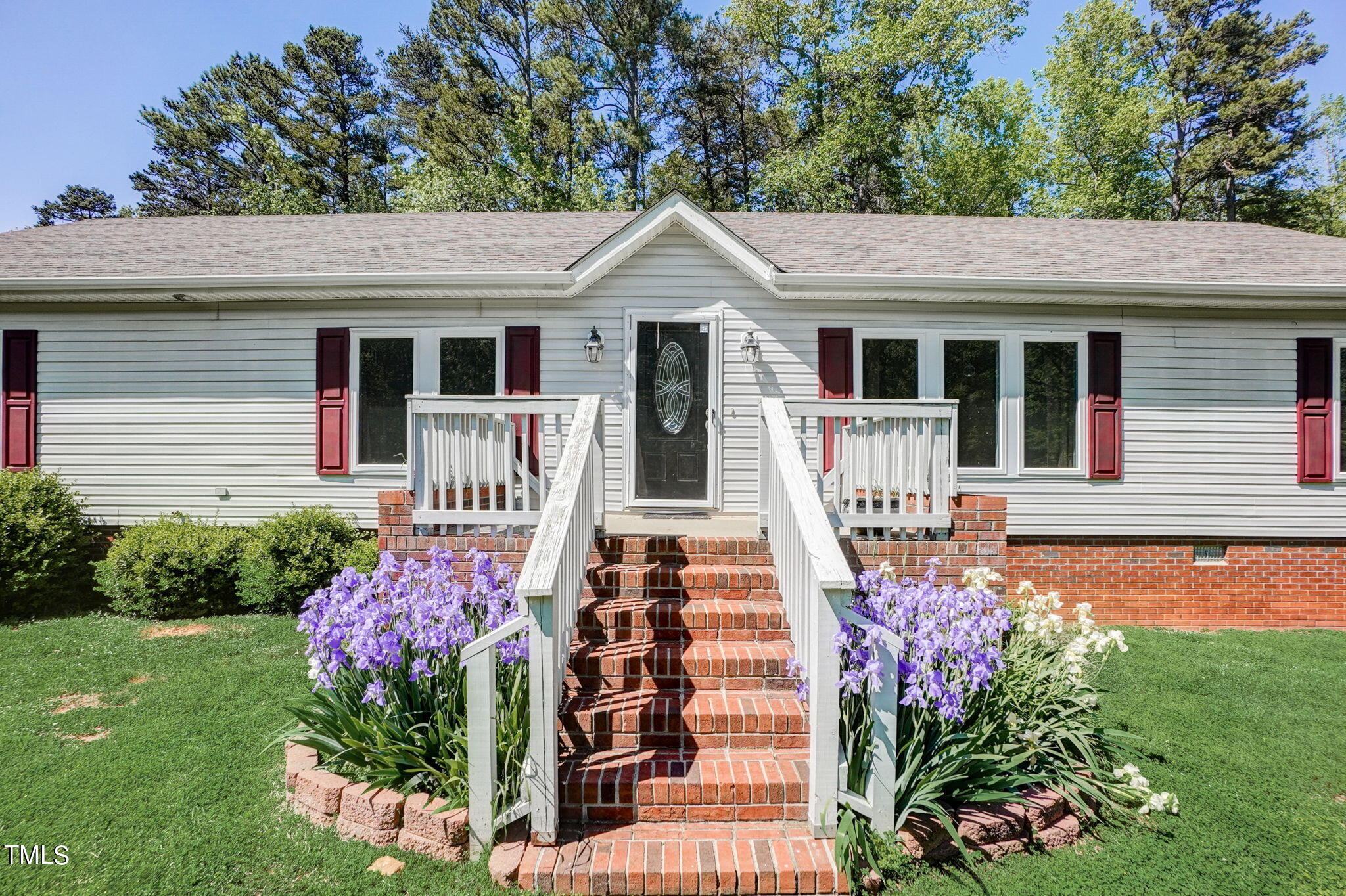 7204 New Sharon Church Road Rougemont, NC 27572 - Photo 2 of 48 a front view of a house with a yard