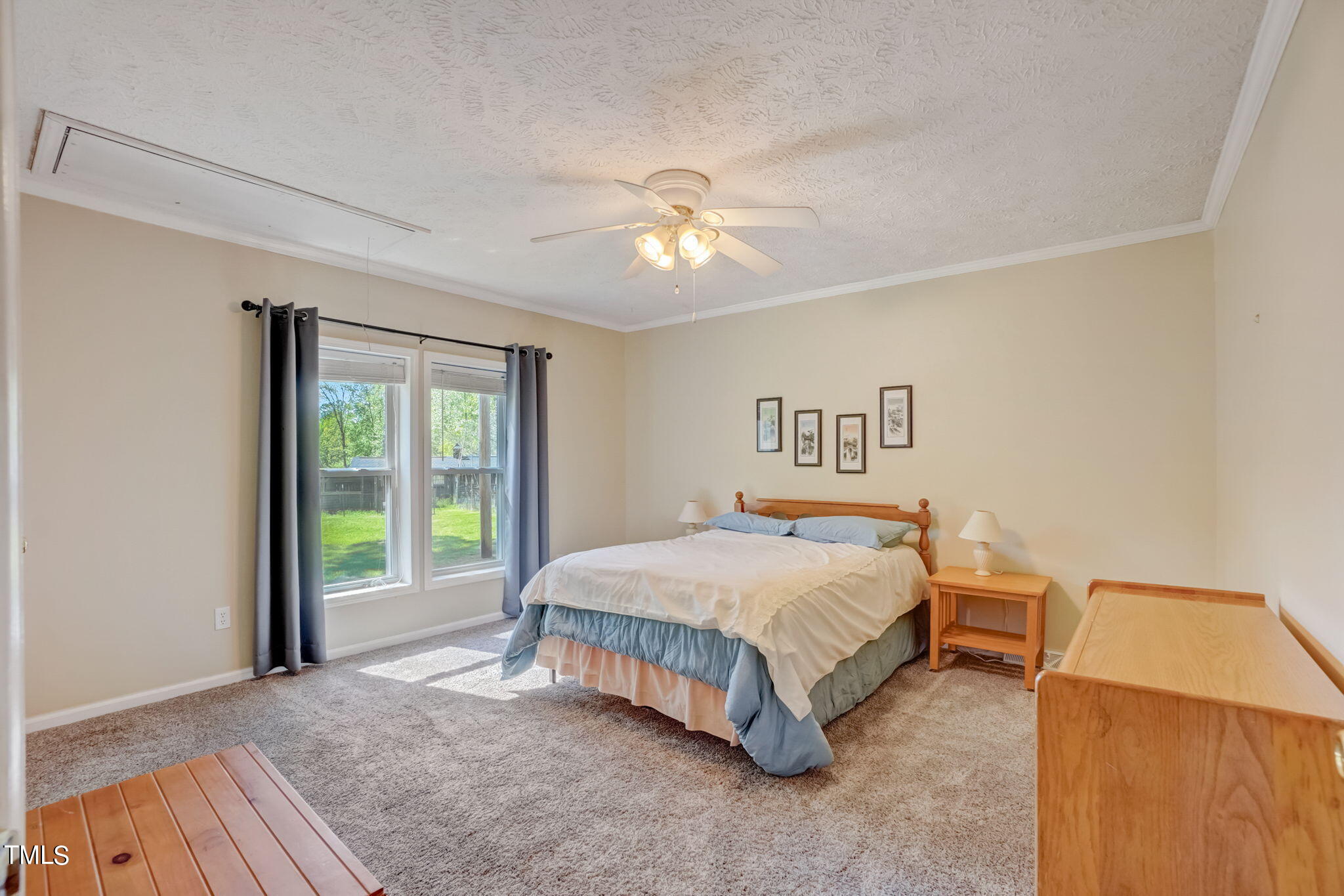 7204 New Sharon Church Road Rougemont, NC 27572 - Photo 21 of 48 a bedroom with a bed and a window