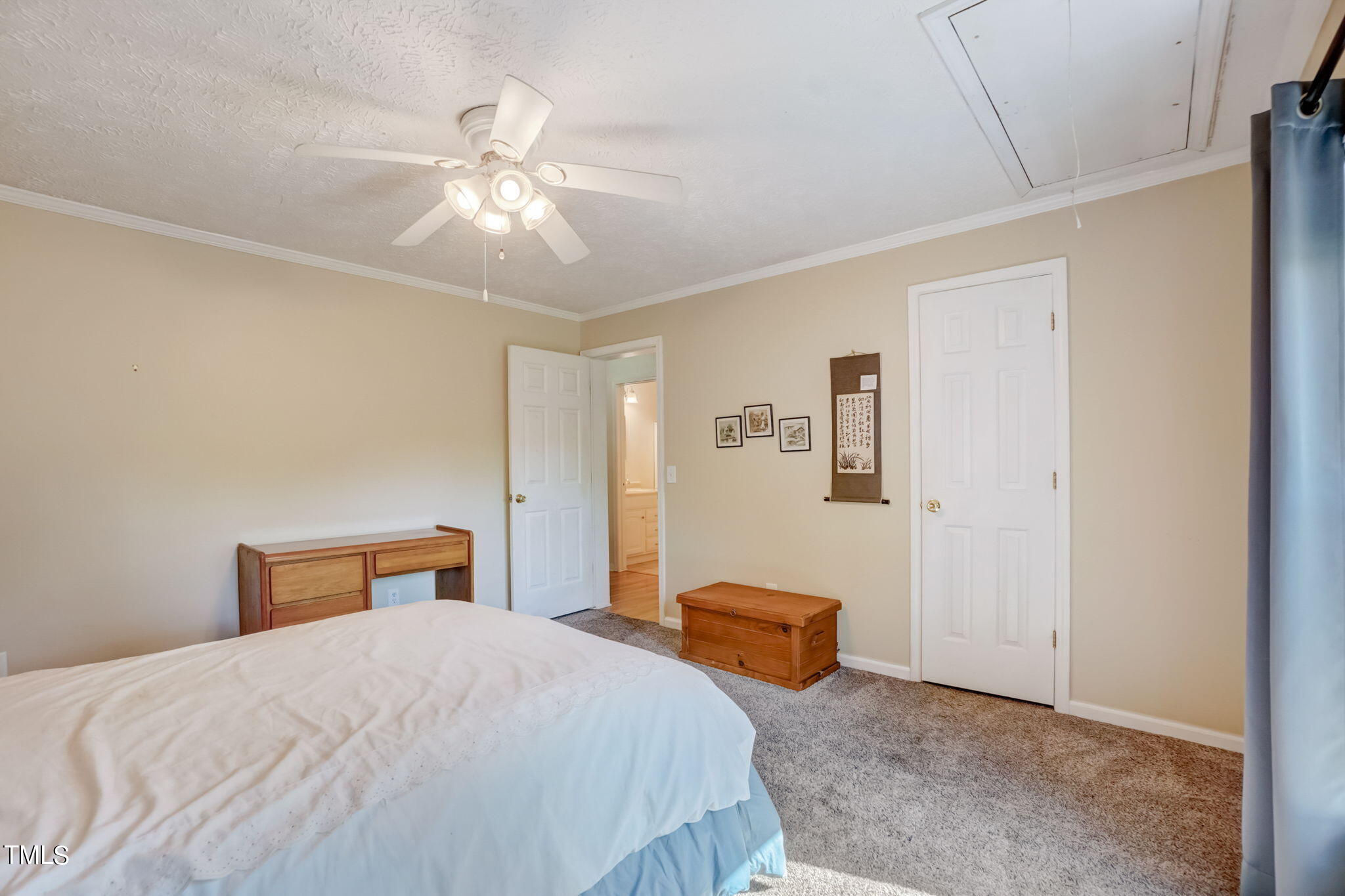7204 New Sharon Church Road Rougemont, NC 27572 - Photo 22 of 48 a bedroom with a bed and ceiling fan