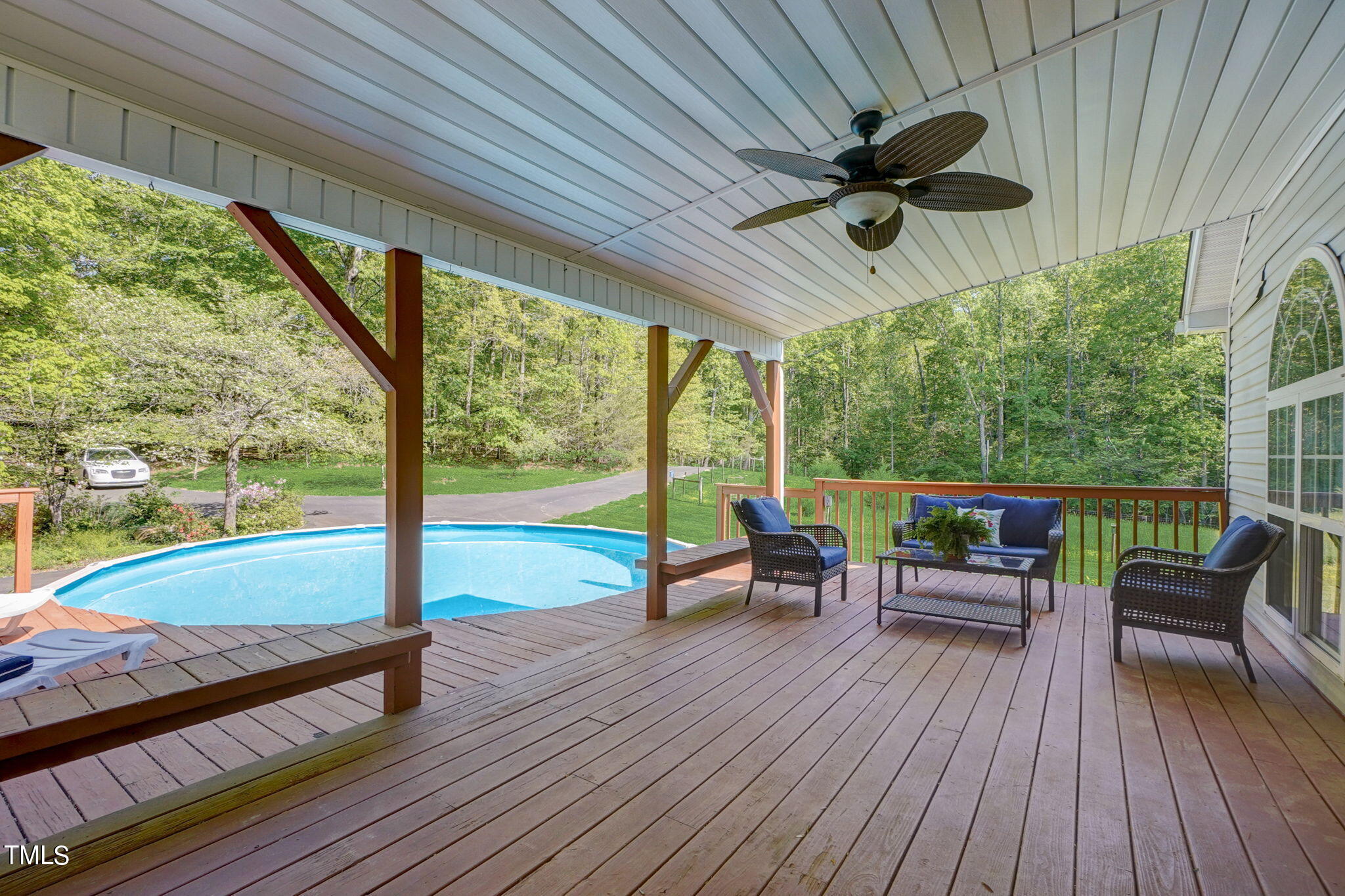 7204 New Sharon Church Road Rougemont, NC 27572 - Photo 27 of 48 a view of a deck with wooden floor and outdoor seating